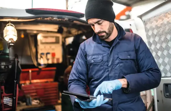 Refrigeration technician working with gloves