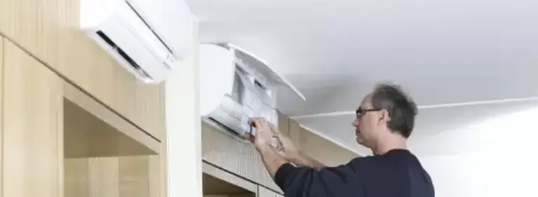 Image: Man Changing a Filter