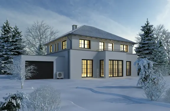 Maison moderne avec unité extérieure et neige